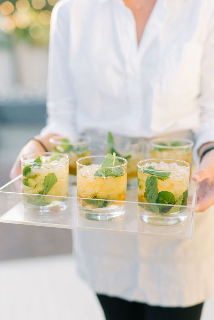Signature cocktails with mint served at a Charleston wedding